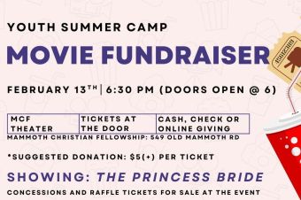 A Person Standing on Snow Covered Ground