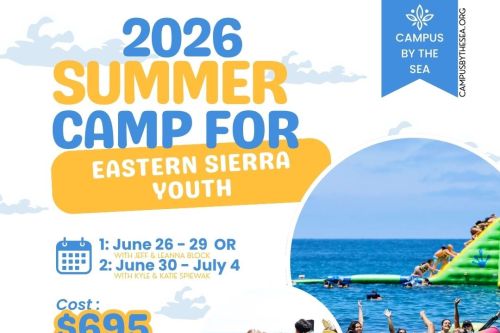 A Person Standing on Snow Covered Ground